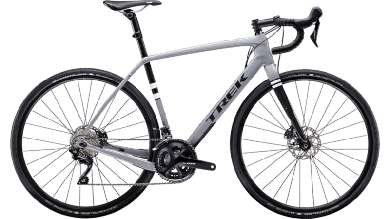 Gravel-bike of the company Trek with seat tube suspension in carbon frame. Disc brakes and color grey with white and black
